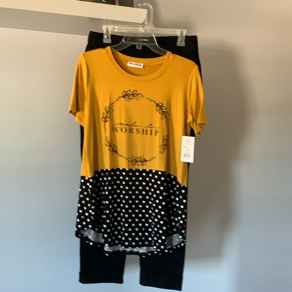 S/M, new, long tee top with made to Worship” on front side.